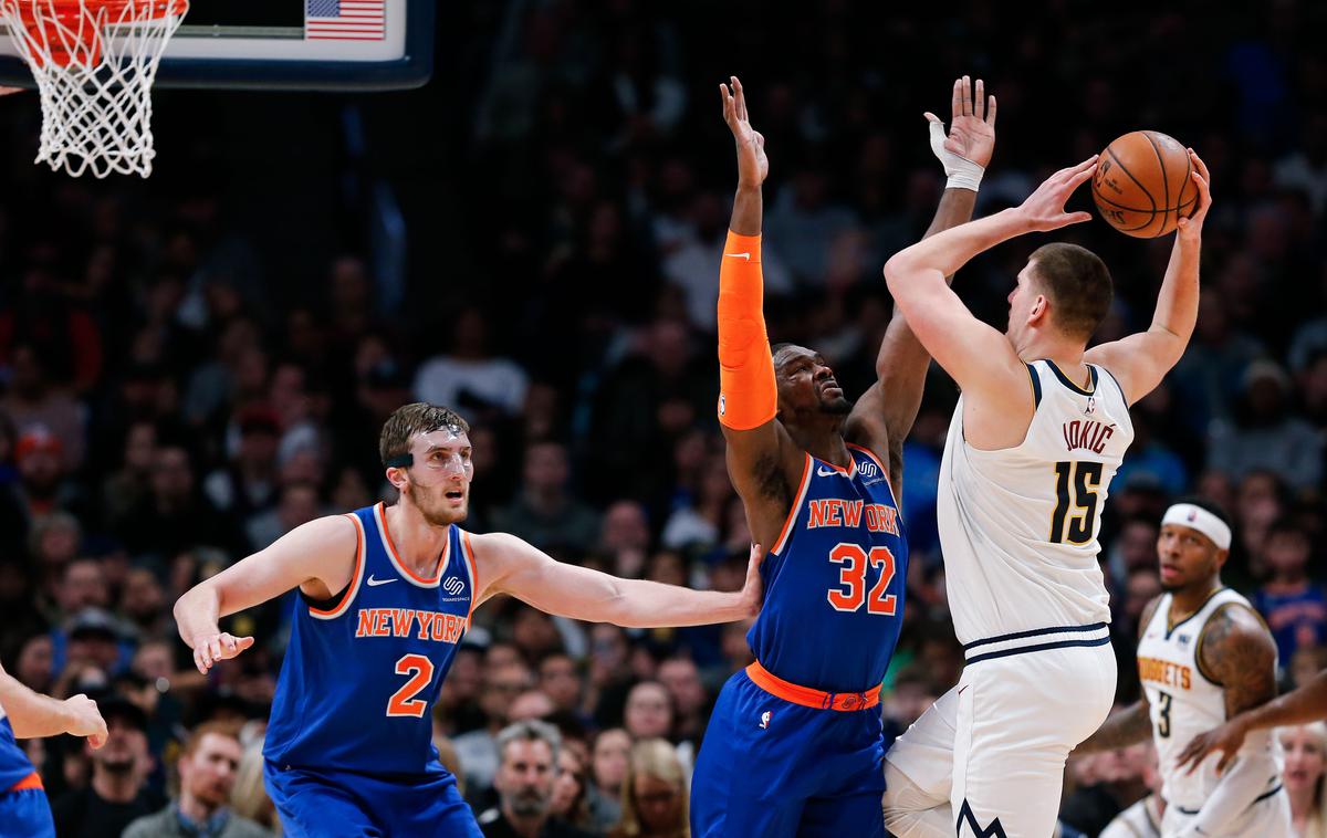 Nikola Jokić | Srb Nikola Jokić se je ob zmagi Denverja izkazal s trojnim dvojčkom. | Foto Reuters