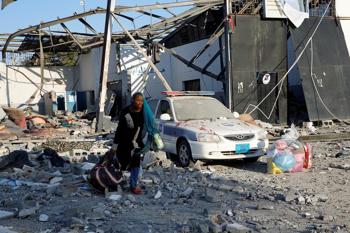 Napad na migrantski center pri Tripoliju | Foto Reuters