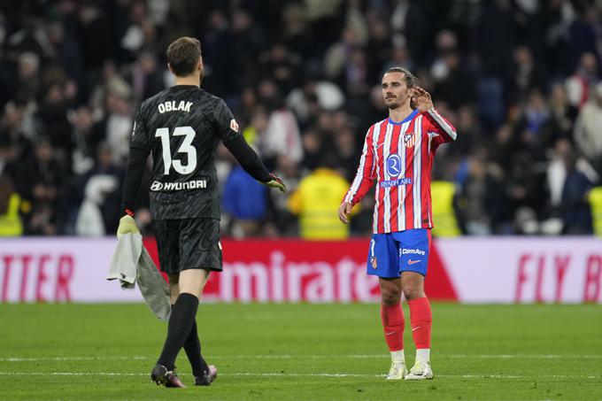 Veselje dolgoletnih soigralcev Jana Oblaka in Antoina Griezmanna po remiju na gostovanju pri Realu. | Foto: Guliverimage