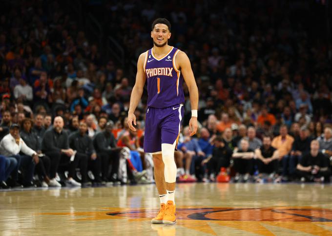 Devin Booker je poskrbel za strelski rekord večera v ligi NBA. | Foto: Reuters