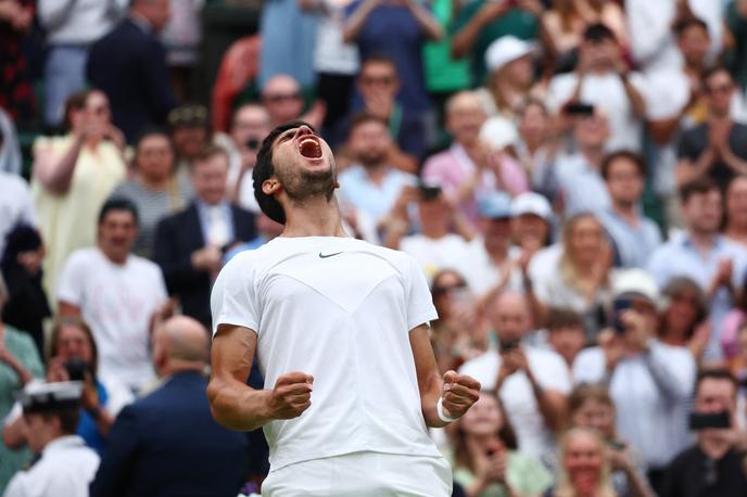 Carlos Alcaraz | Carlos Alcaraz je v tretjem krogu izgubil prvi niz na letošnjem Wimbledonu, a ga to ni zmotilo do zmage nad Čilencem Jarryjem. | Foto Reuters