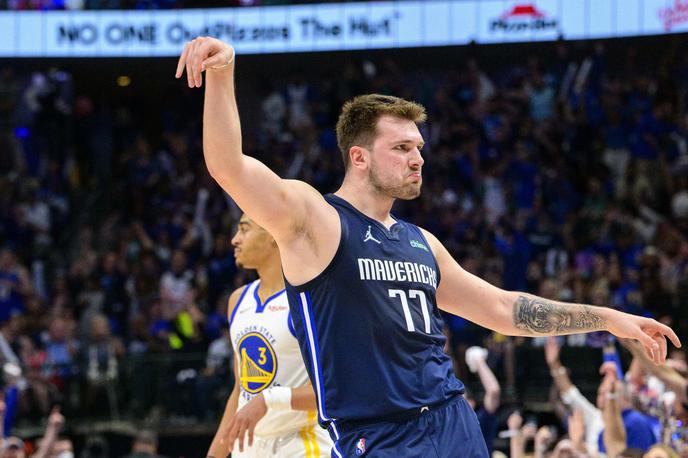 Dallas DOnčić | Luka Dončić, ko je ob zvoku sirene prve četrtine zadel trojko. | Foto Reuters