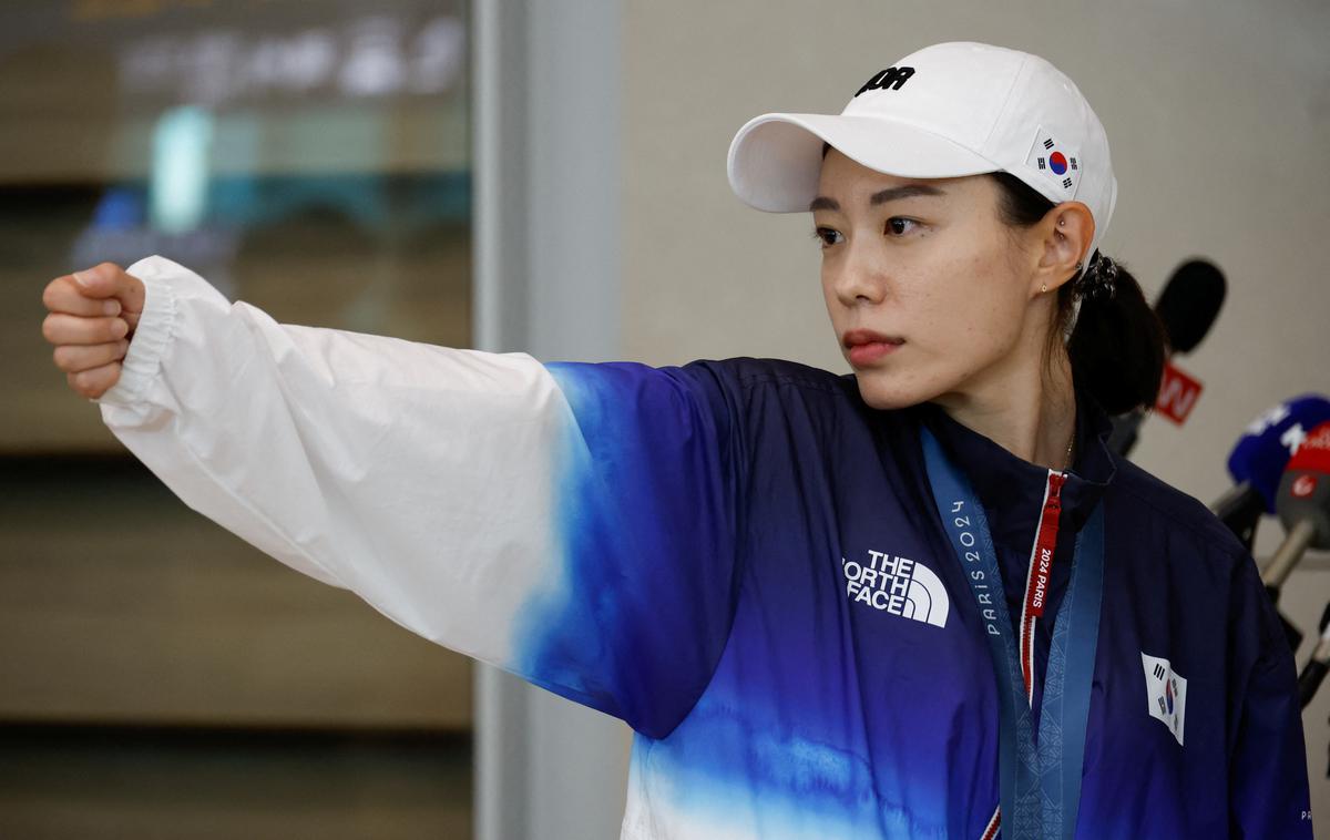 Kim Ye-ji | Južnokorejsko strelko Kim Ye-ji so danes prepeljali v bolnišnico, potem ko je med novinarsko konferenco v domovini omedlela. | Foto Reuters