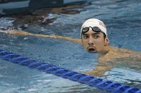 Phelps po olimpijski slavi spet v bazenih