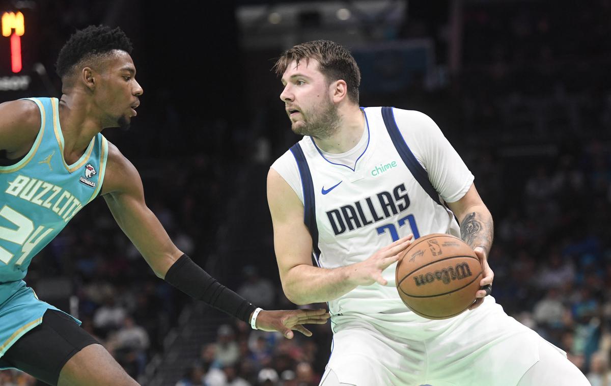 Luka Dončić | Luka Dončić se lahko po novem pohvali že s 77 trojnimi dvojčki. Ni kaj, to je njegova najljubša številka! | Foto Reuters