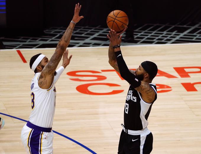 Markieff Morris ni mogel ustaviti razigranega brata dvojčka Marcusa Morrisa. | Foto: Reuters