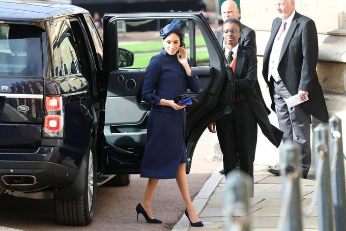 Meghan je na poroki nosila širše krojen plašč, s katerim je lahko skrila trebušček. | Foto: Getty Images