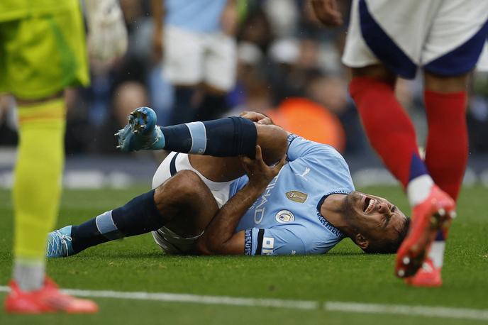 Rodri Manchester City | Rodri se je na nedeljskem derbiju kroga težje poškodoval in mora na operativni poseg. Lahko se zgodi, da je sezona zanj že končana. | Foto Reuters