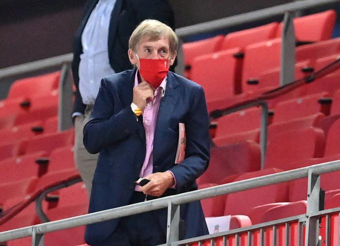 ... in Kenny Dalglish na sredini tekmi Liverpoola. | Foto: Reuters