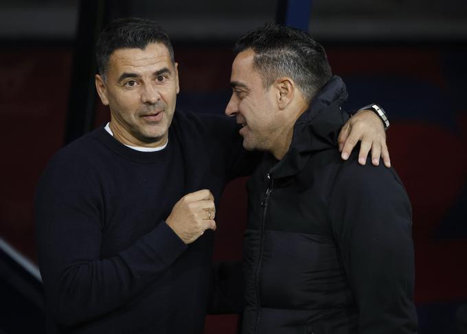 Xavi je športno priznal poraz pet let starejšemu stanovskemu kolegu. | Foto: Reuters