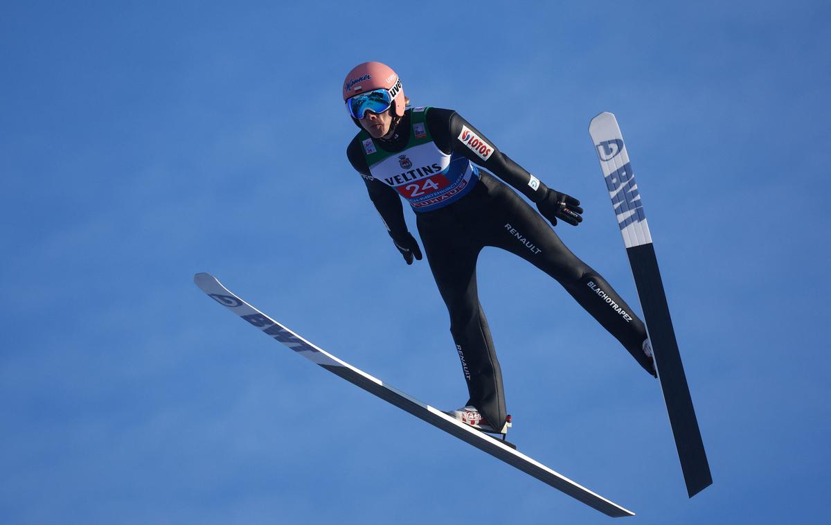 Dawid Kubacki | Dawid Kubacki, ki v letošnji sezoni ne najde prave forme, je bil na pozitiven na testiranju na novi koronavirus in bo izpustil tekme v Zakopanah. | Foto Reuters