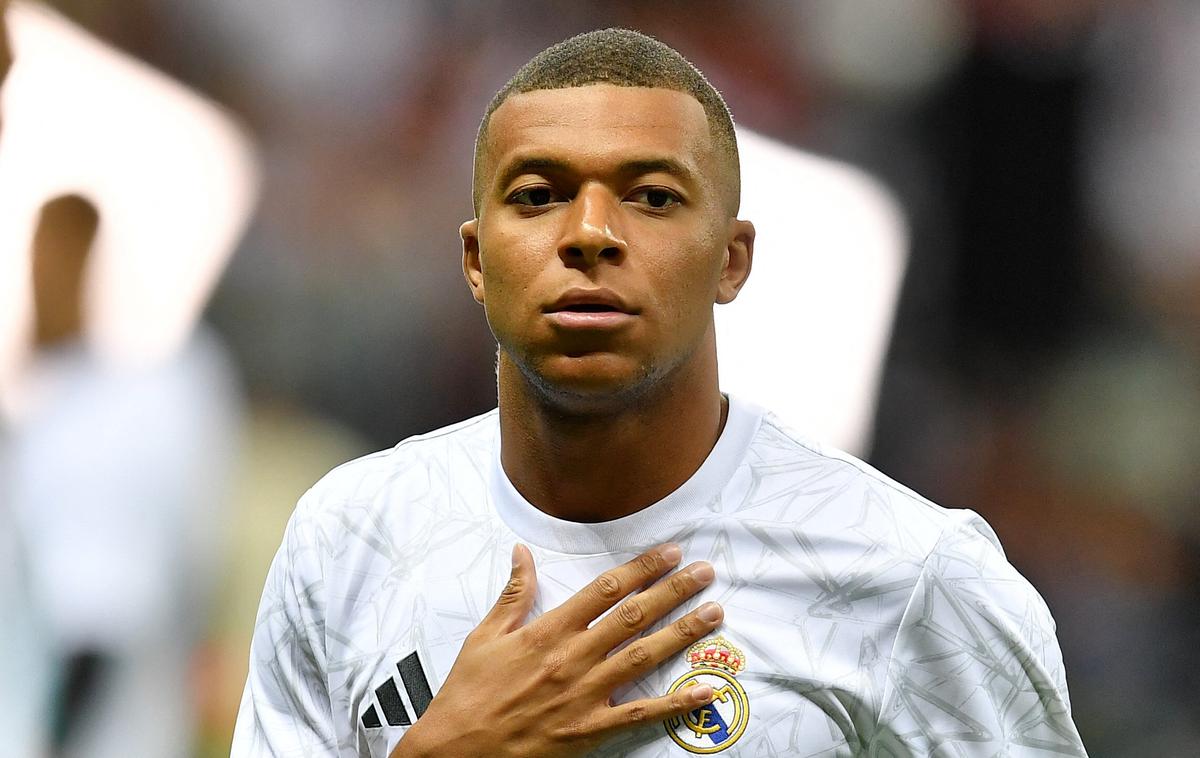 Kylian Mbappe | Kylian Mbappe je s PSG postal petkratni francoski prvak, trikratni zmagovalec francoskega pokala in superpokala, dvakrat je osvojil ligaški pokal, zmanjkala je le najbolj čislana od nogometnih klubskih lovorik, naslov zmagovalca lige prvakov. Z Realom bo branil evropski naslov, že v krstnem nastopu za kraljevi klub pa je osvojil evropsko lovoriko. | Foto Reuters