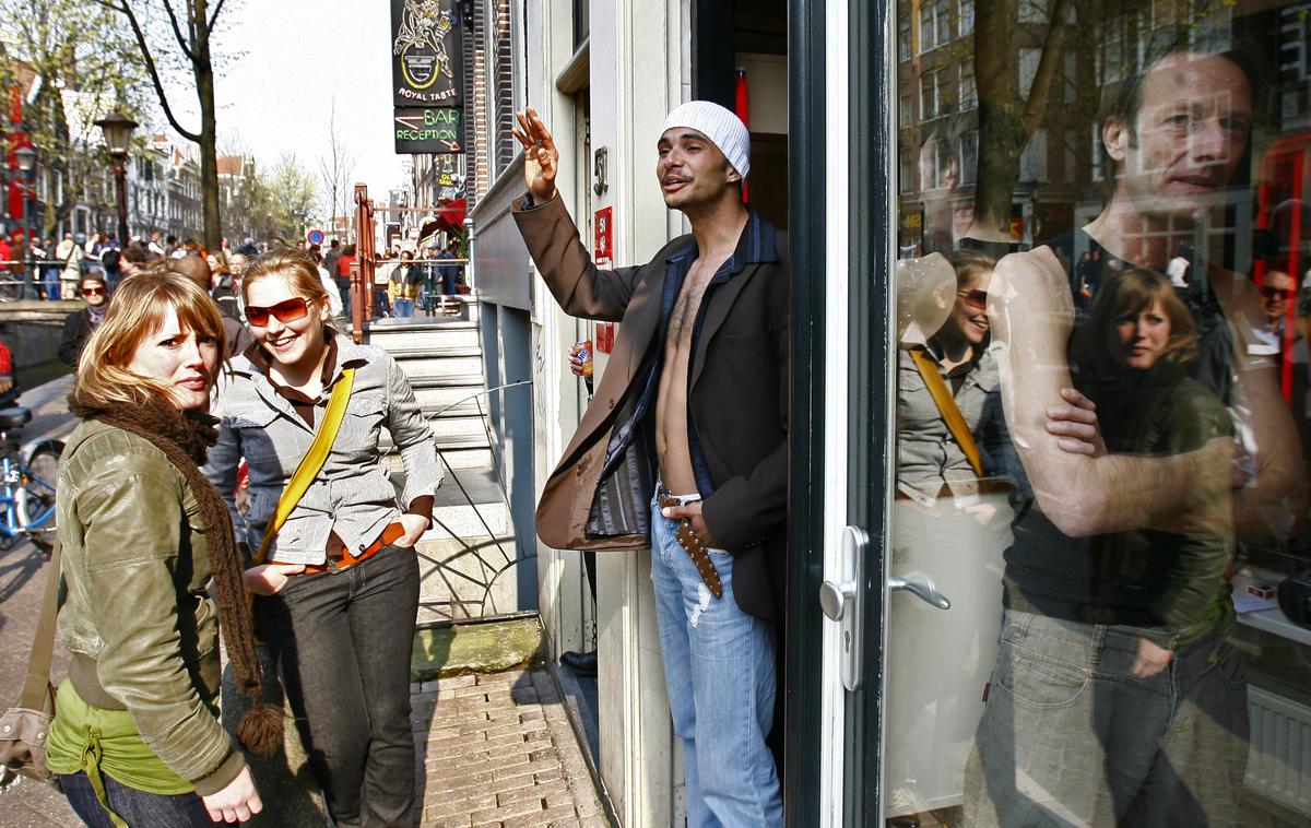 Amsterdam rdeča četrt | V amsterdamski rdeči četrti so od maja napovedani strožji pogoji poslovanja. | Foto Reuters