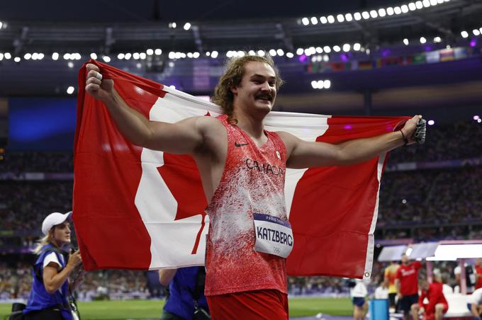 Ethan Katzberg je olimpijski prvak v metu kladiva. | Foto: Reuters