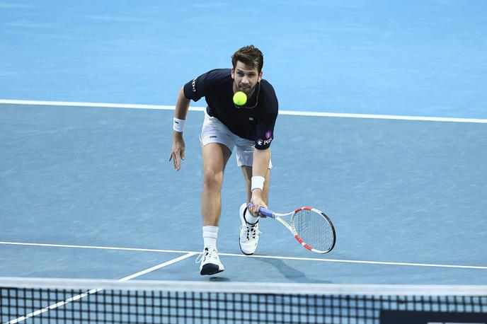 Cameron Norrie | Britanec Cameron Norrie je zaradi poškodbe zapestja preventivno odpovedal četrtfinalni nastop v Aucklandu. | Foto Guliverimage