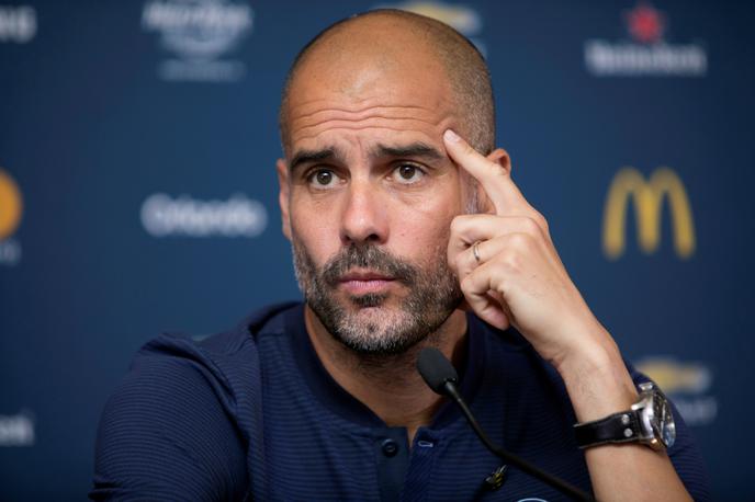 Pep Guardiola | Pep Guardiola pred novinarji v Šanghaju ni skrival slabe volje.  | Foto Reuters