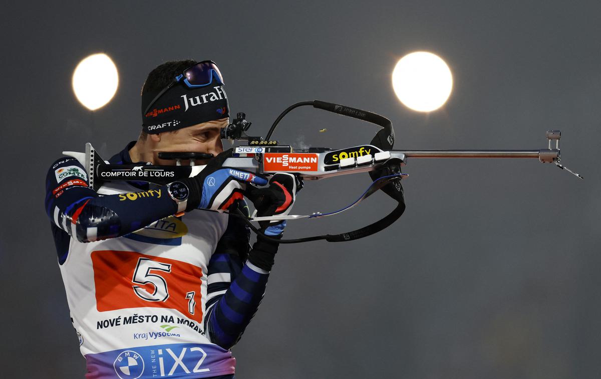 Quentin Fillon Maillet SP biatlon | Zlato v štafeti mešanih parov sta osvojila Quentin Fillon Maillet in Lou Jeanmonnot. | Foto Reuters