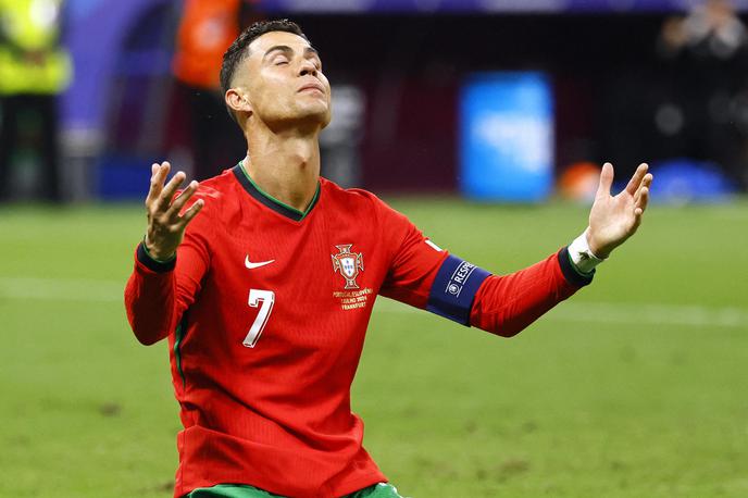 Euro 2024 Slovenija Portugalska Cristiano Ronaldo | Cristiano Ronaldo in žena Georgina sta na elitni ustanovi St. Julian doživela hladen tuš. Njunim otrokom so domnevno zaradi prevelike prepoznavnosti staršev zavrnili vpis. | Foto Reuters