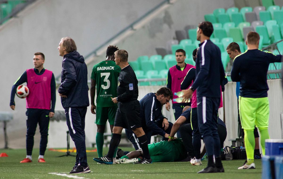 Jucie Lupeta | Jucie Lupeta po stiku z betonskim zidom ni mogel več nadaljevati tekme. Kaj lahko bi počilo kakšno rebro, več bo znano morda že v ponedeljek. | Foto Urban Urbanc/Sportida