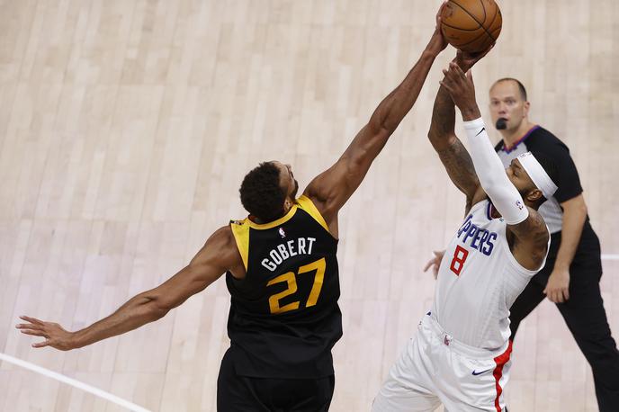 Rudy Gobert | Francoski center Rudy Gobert je z blokado v zadnji sekundi preprečil, da bi Marcus Morris izsilil podaljšek. | Foto Reuters