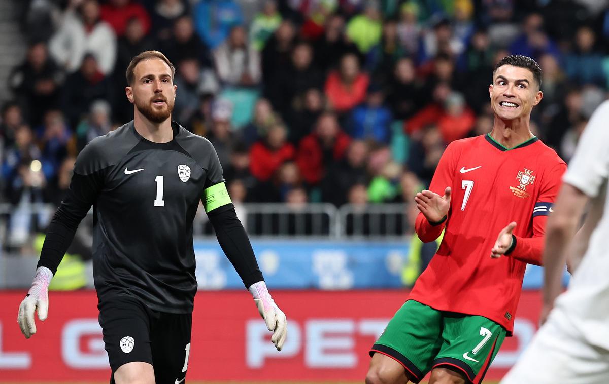 Jan Oblak Cristiano Ronaldo | Cristiano Ronaldo v torek ni zatresel mreže Janu Oblaku. Še več, njegova Portugalska je nepričakovano izgubila proti Sloveniji, ki je presenetila zveneče goste z izjemno predstavo, s katero je dala misliti tekmecem na Euru 2024. | Foto www.alesfevzer.com