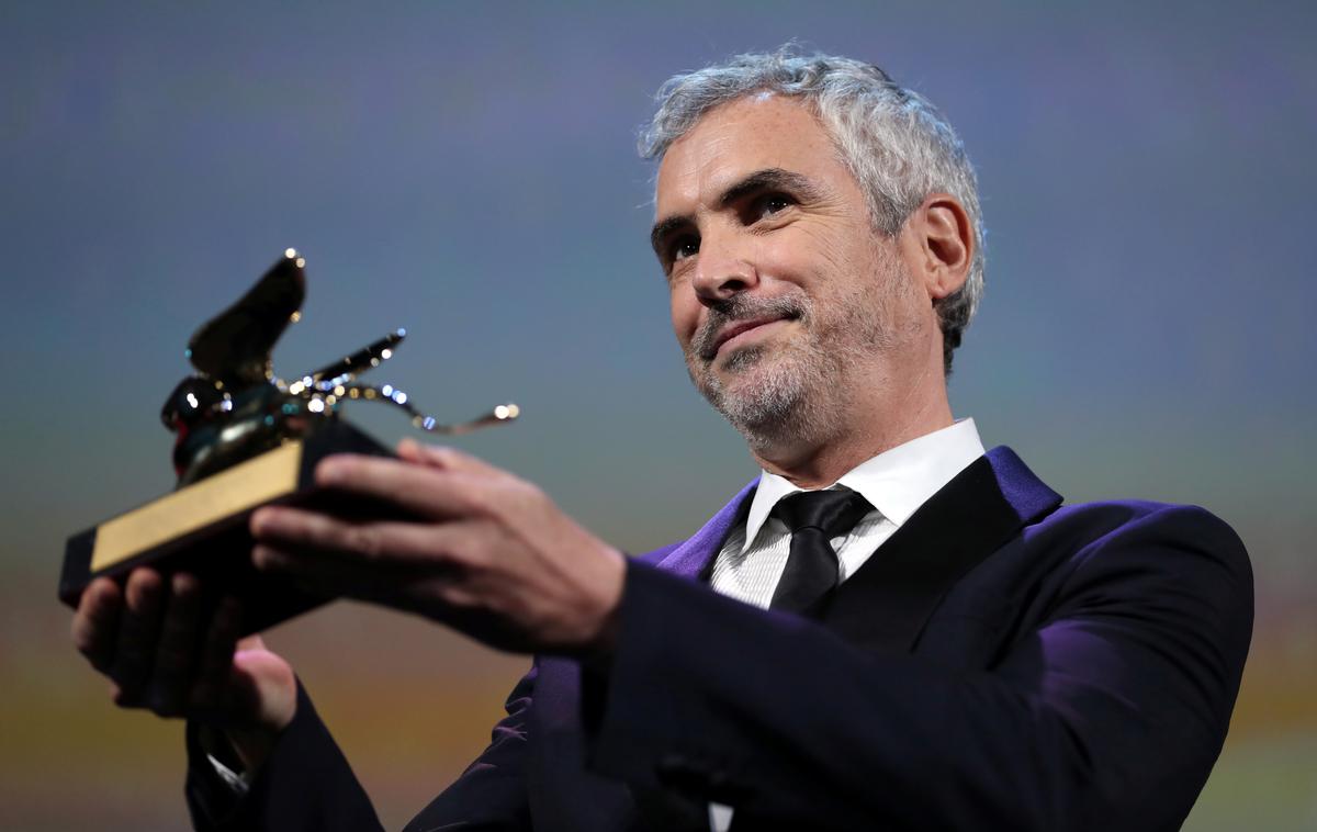 Alfonso Cuaron | Lani so v Benetkah za najboljši film razglasili črno-belo dramo Roma, ki jo je režiral Alfonso Cuaron. | Foto Reuters