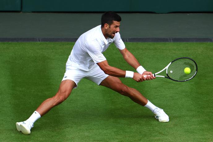 Wimbledon Novak Đoković | Novak Đoković se je v polfinale prebil po štirih nizih. | Foto Reuters