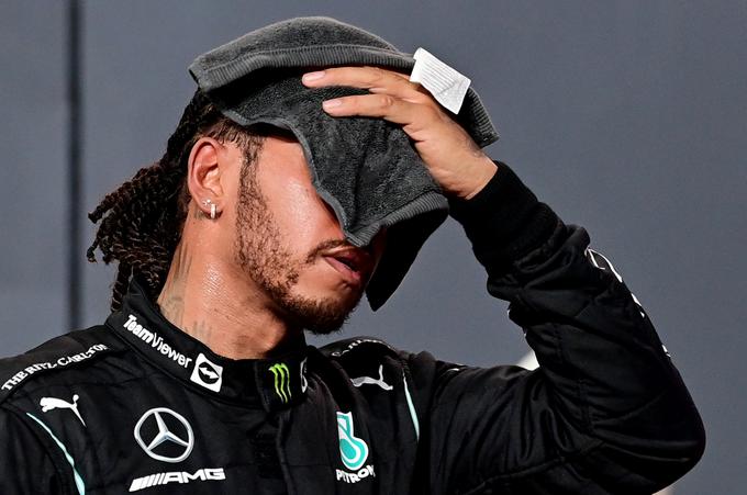 Hamilton je bil na cilju povsem izčrpan. | Foto: Reuters