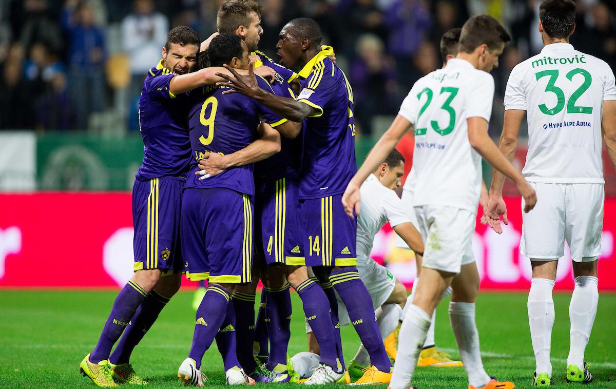 Maribor Olimpija 2014 | Pred devetimi leti sta Maribor in Olimpija v derbiju remizirala s 3:3, vijolicam pa je točko zagotovil Marcos Tavares z zadetkom v prvi minuti sodnikovega podaljška. Zanimivo je, da je na tej tekmi izmed vseh igralcev, ki bodo danes kandidiral za derbi v mestu ob Dravi, zaigral le Nemanja Mitrović. Zdajšnji branilec Maribora pa je takrat nosil še dres ljubljanskega kluba ... | Foto Vid Ponikvar