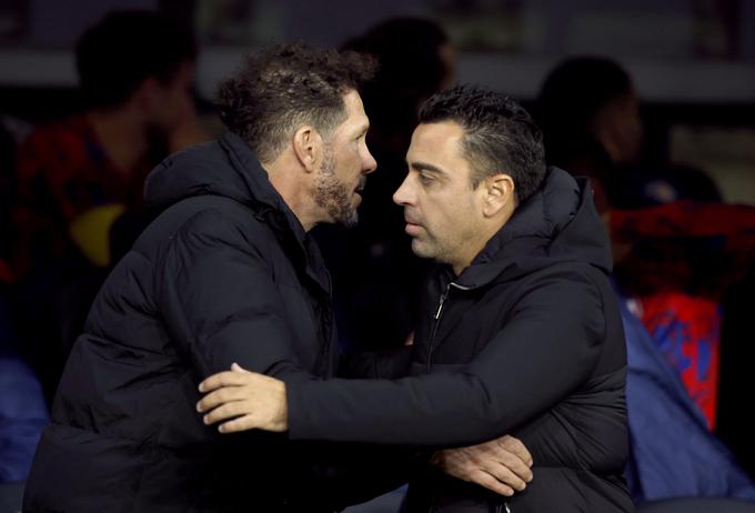 V nedeljskem derbiju je Xavi Hernandez v trenerskem obračunu ugnal Diega Simeoneja. | Foto: Reuters