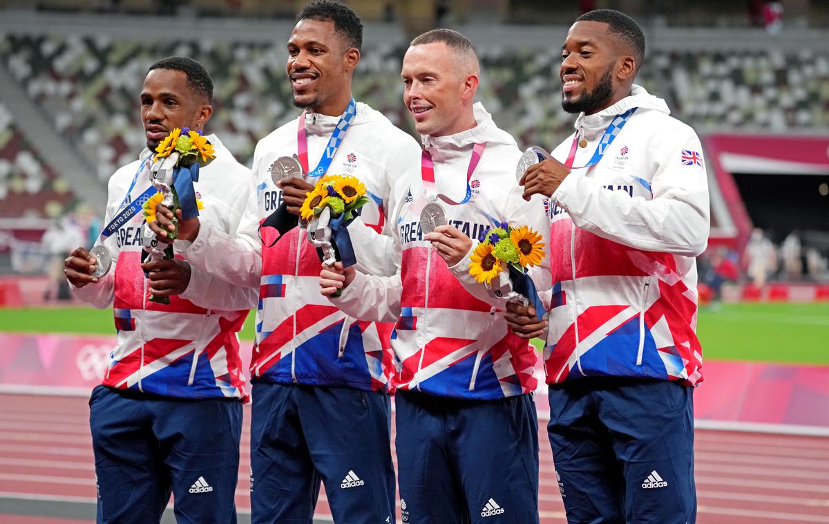 Chijindu Ujah, Zharnel Hughes, Richard Kilty in Nethaneel Mitchell-Blake | Takole so se Chijindu Ujah, Zharnel Hughes, Richard Kilty in Nethaneel Mitchell-Blake veselili srebrnega olimpijskega odličja. Danes so ga morali vrniti. | Foto Reuters