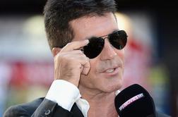 Simon Cowell: Ponosen sem na to, da bom postal oče