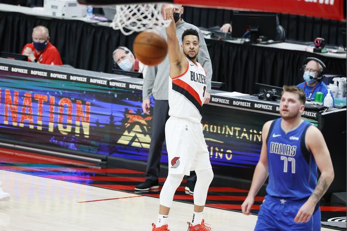 McCollum je rešetal mrežico Dallasa in bil ključen mož za zmago Portlanda. | Foto: Reuters