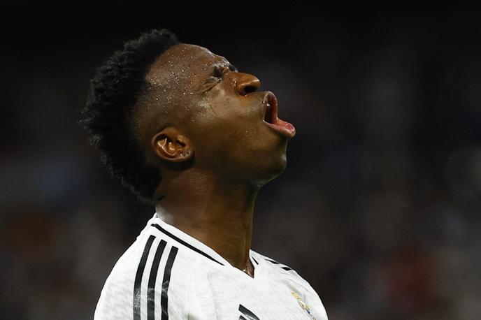 Vinicius | Zvezdnik Real Madrida, Brazilec Vinicius Junior letos kljub velikim napovedim ni bil izbran za najboljšega nogometaša minule sezone. Zaradi tega je kraljevi klub iz Madrida bojkotiral slavnostno podelitev zlate žoge v Parizu. | Foto Reuters