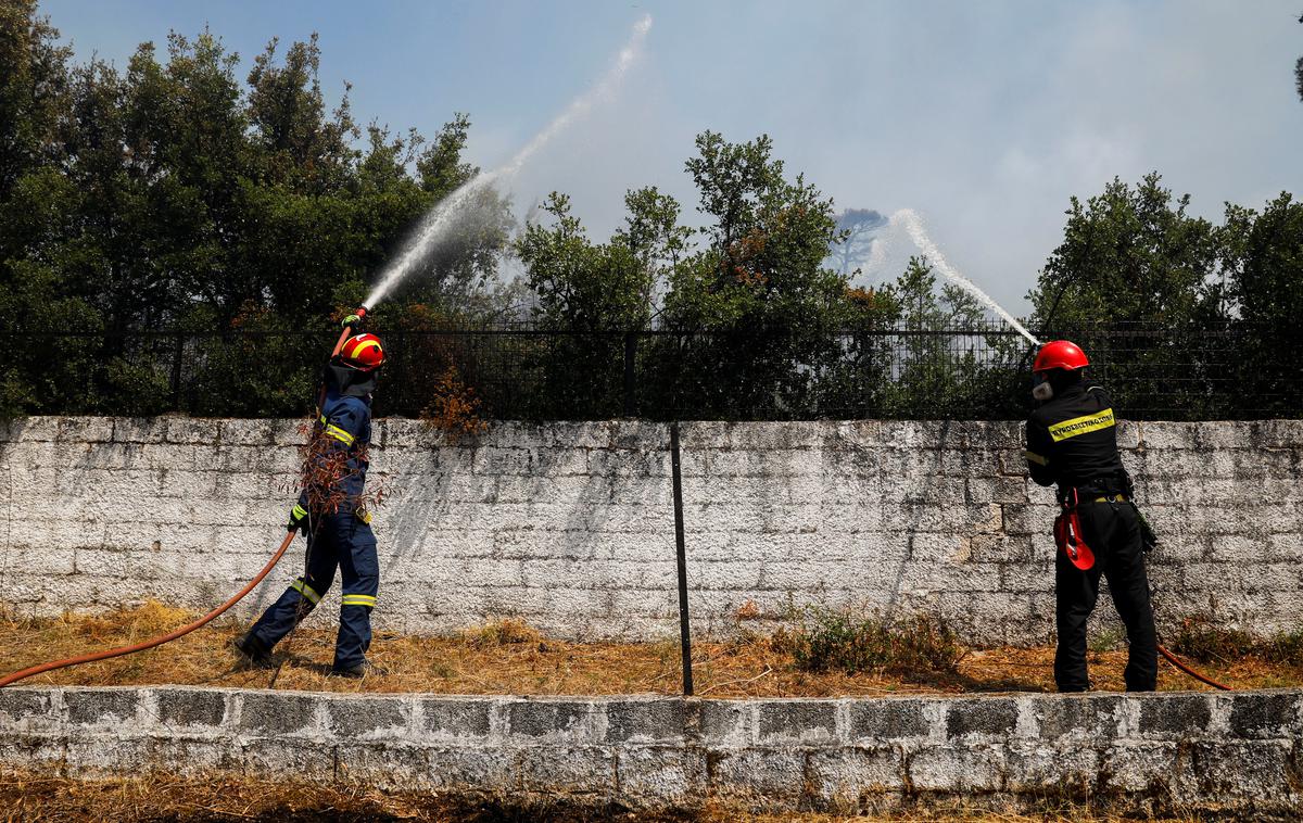 Grčija | Padavine so tako končno prekinile dolgotrajno sušo, ki je bila glavni razlog za uničujoče požare. | Foto Reuters