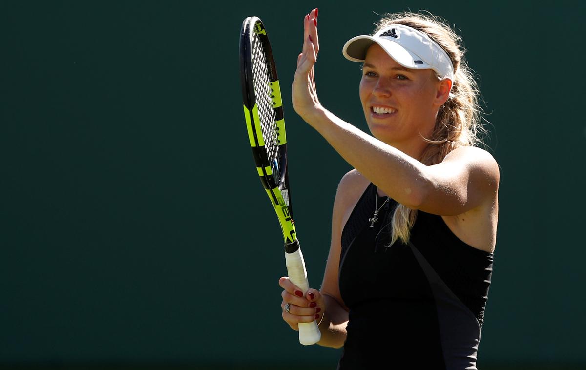 Caroline Wozniacki | Caroline Wozniacki je po vrnitvi na teniška igrišča prejela posebni povabili za nastop na odprtem prvenstvu ZDA ter največjem kanadskem turnirju na trdi podlagi, ki bo letos v Montrealu. | Foto Reuters