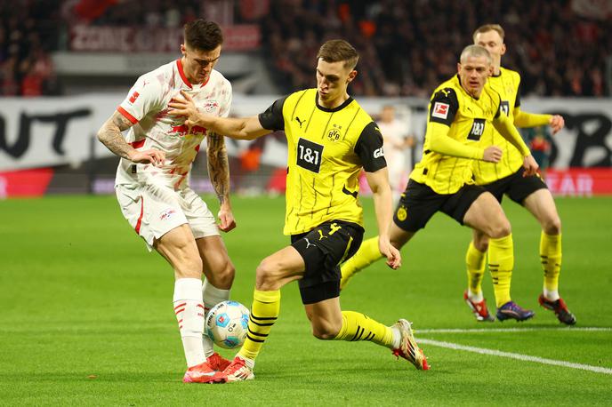 Benjamin Šeško | Benjamin Šeško je proti Borussii Dortmund odigral vso tekmo in prispeval podajo za zadetek. V ponedeljek bo pripotoval v domovino na reprezentančni zbor na Gorenjskem. | Foto Reuters