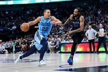 Memphis Grizzlies guard Desmond Bane (22) Dallas Mavericks forward Derrick Jones Jr. (55)