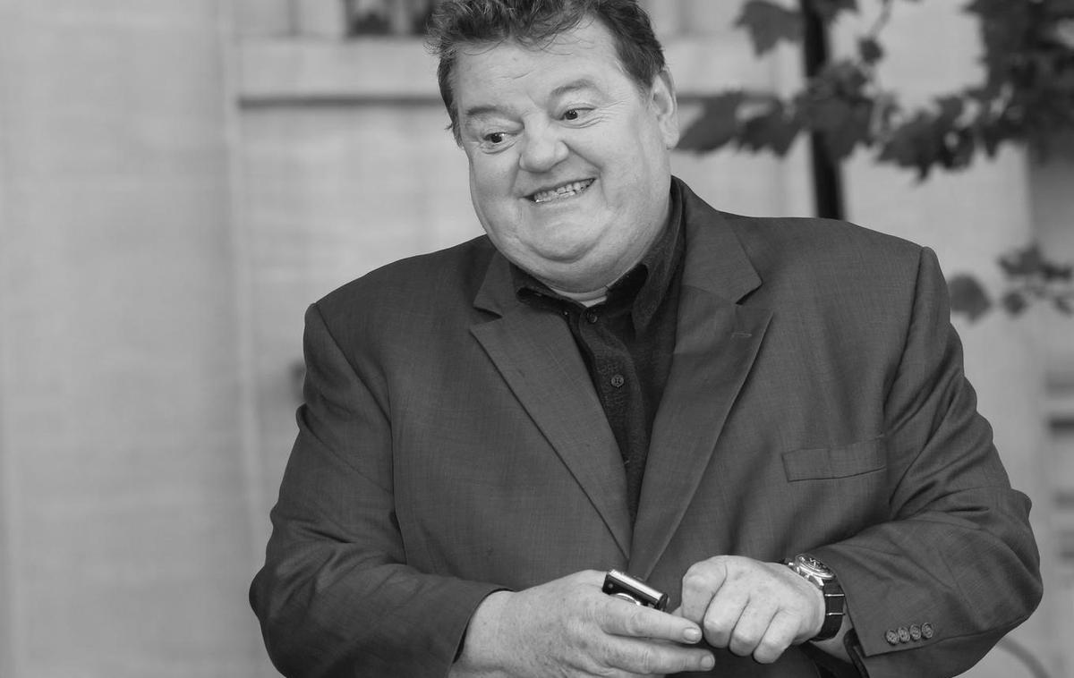 Robbie Coltrane | Coltrane je bil v Veliki Britaniji že znan igralec in komik, ko ga je J. K. Rowling osebno predlagala režiserju Chrisu Columbusu za vlogo čuvaja Hogwartsa Rubeusa Hagrida. | Foto Guliverimage/AP