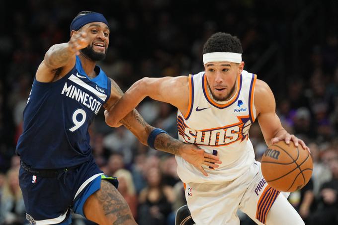 Tako Nickell Alexander-Walker kot tudi Devin Booker sta dvoboj v Phoenixu končala pri 13 točkah. | Foto: Reuters