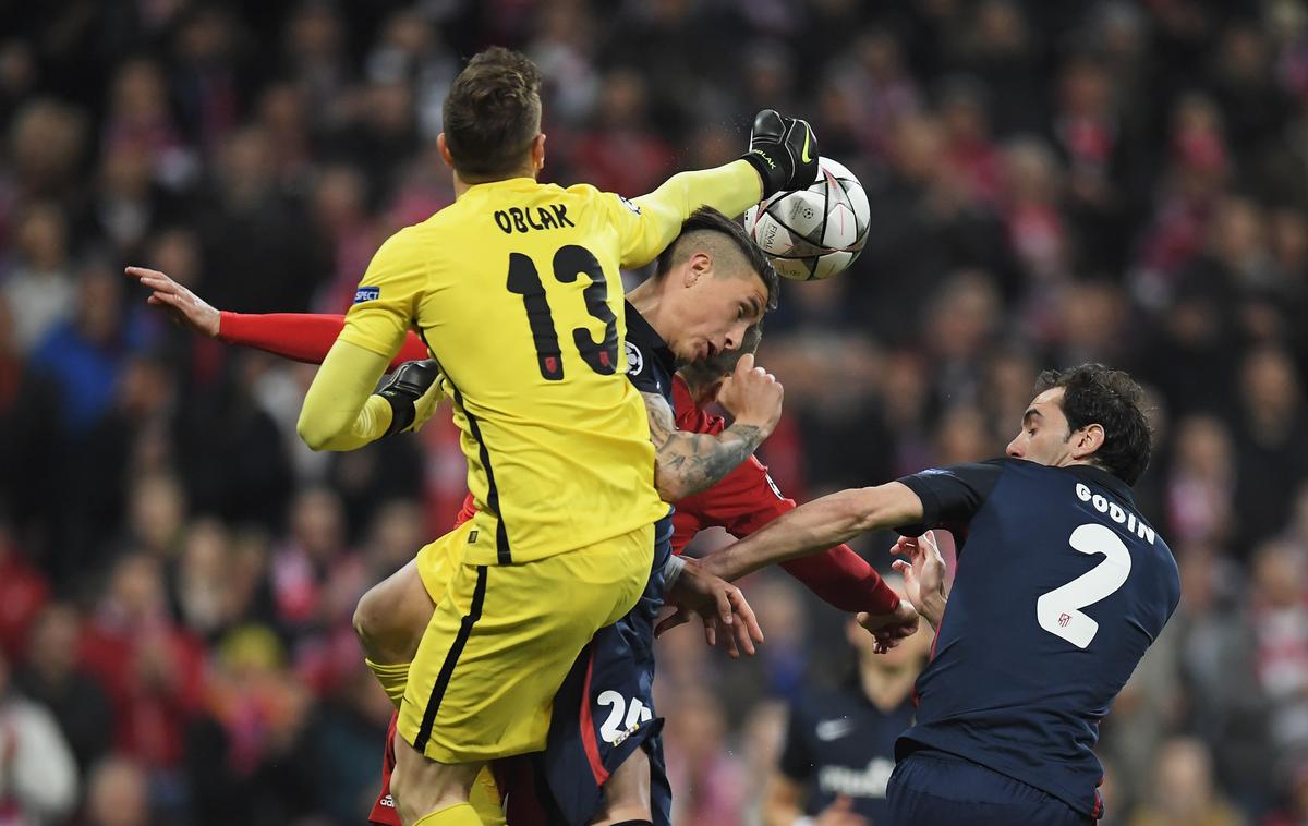 Jan Oblak Gimenez Godin Atletico | Jan Oblak bo v soboto, kot kaže, v obrambi sodeloval tako z Diegom Godinom kot tudi Josejem Gimenezom. | Foto Guliver/Getty Images