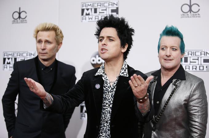 Mike Dirnt, Billie Joe Armstrong in Tre' Cool (z leve proti desni) se po 19 letih vračajo v Ljubljano. | Foto: Reuters