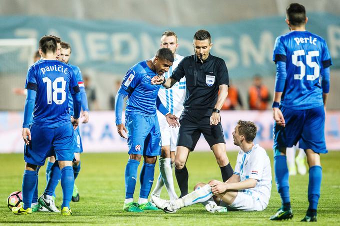 Gostje iz Zagreba so se znašli v težavah. Izgubljali so z 0:1. Brazilec s hrvaškim potnim listom Sammir je tako izgubil živce nad Filipom Bradarićem, enem izmed številnih nekdanjih nogometašev splitskega Hajduka, ki pod taktirko Matjaža Keka doživljajo najboljše dneve v karieri. | Foto: Grega Valančič/Sportida