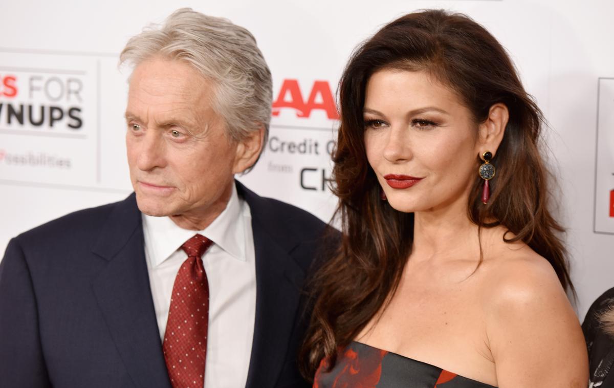 Michael Douglas, Catherine Zeta-Jones | Catherine verjame svojemu možu, da so obtožbe lažne. | Foto Getty Images