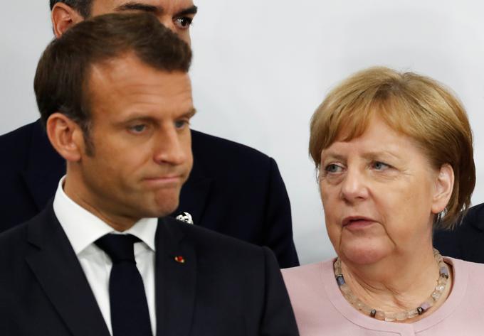 Francoski predsednik Emmanuel Macron in nemška kanclerka Angela Merkel na vrhu G20 v Osaki naj Japonskem. | Foto: Reuters