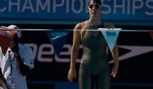 Phelpsu šesta medalja, Tunizijcu maraton