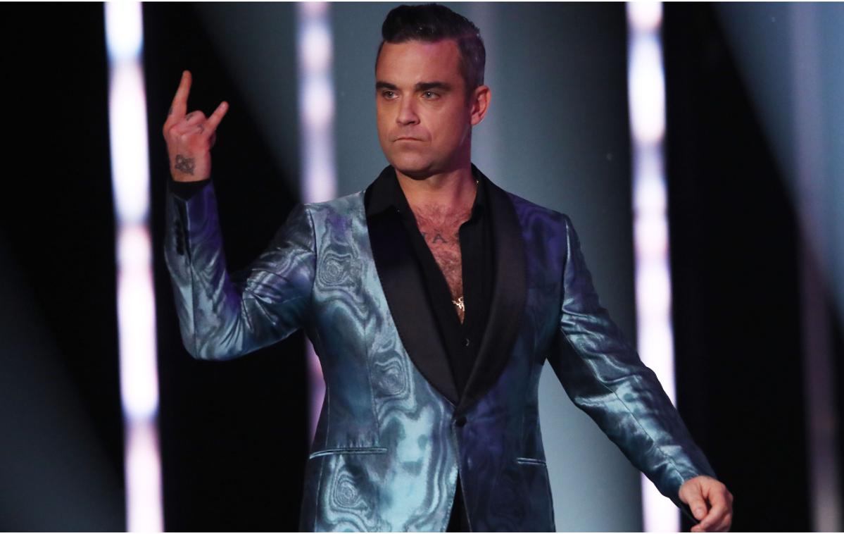 Robbie Williams | Robbie Williams in njegova soproga sta četrtega sina dobila s pomočjo nadomestne matere. | Foto Getty Images