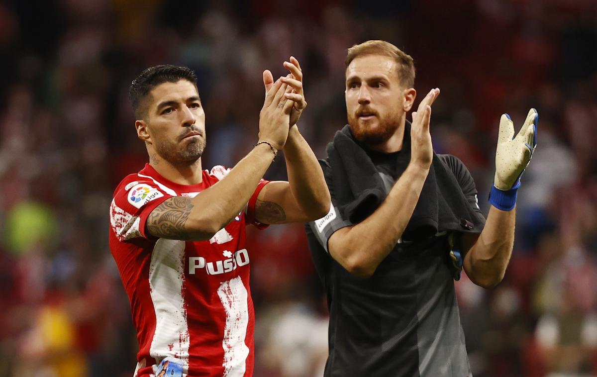 Jan Oblak Luis Suarez | Jan Oblak se je z Atleticom veselil zmage nad Cadizom, prejel je le en gol, ki si ga je v 86. minuti zabil kar sam. | Foto Reuters