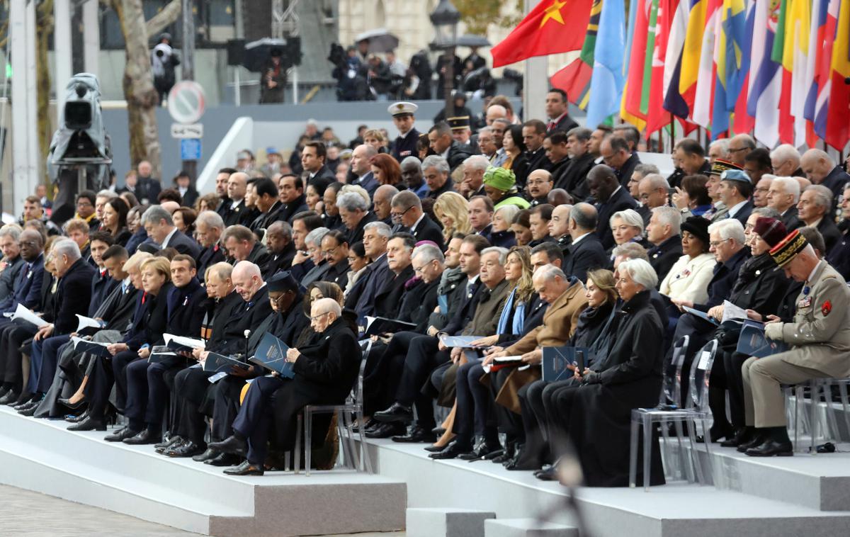 Pariz, proslava, prva svetovna vojna, WWI | Ob Slavoloku zmage v Parizu se je na mednarodni slovesnosti ob stoletnici konca prve svetovne vojne zbralo več kot 80 svetovnih voditeljev, poleg francoskega predsednika Emmanuela Macrona in nemške kanclerke Angele Merkel tudi predsednika ZDA in Rusije. Navzoč je tudi slovenski predsednik Borut Pahor. | Foto Reuters