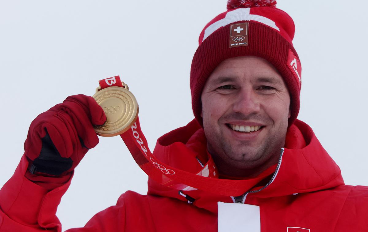 Beat Feuz olimpijsko zlato | Manjkala mu je samo še zlata olimpijska kolajna. Uspelo mu je v Jančingu. | Foto Reuters